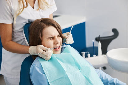 Dentist treating a patient